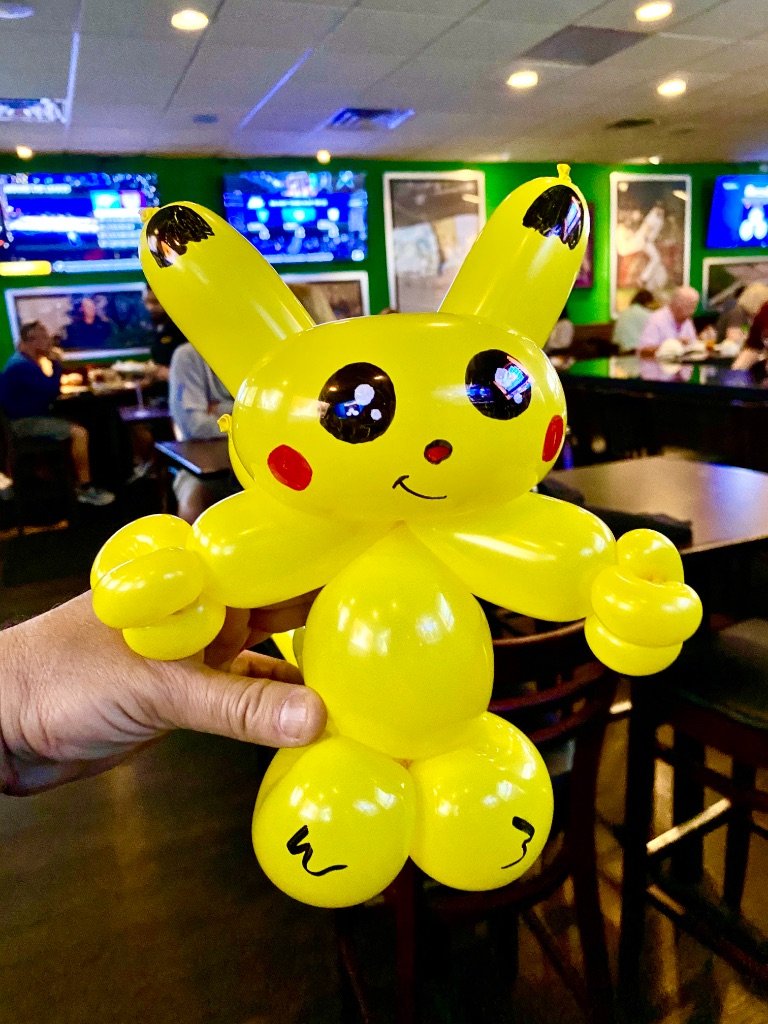 Pikachu balloon at a kid's night event